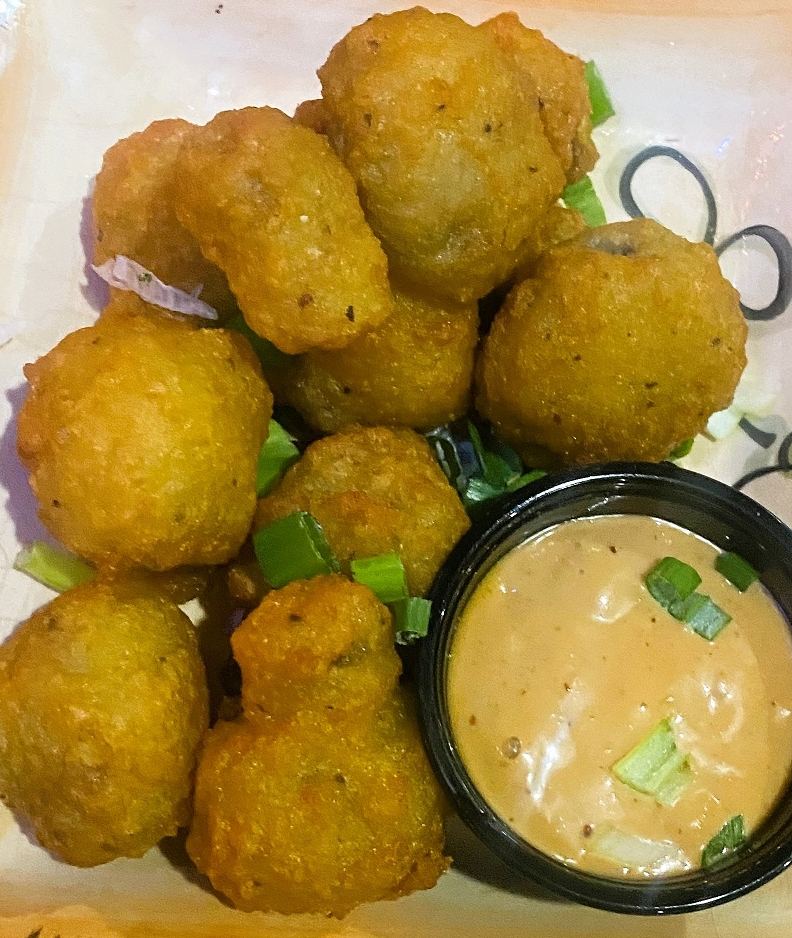 Fried crawfish bites with a creamy dipping sauce